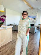 Full view of the ENTRO CREAM PANT SET, ideal for stylish relaxation and everyday wear, with a model showcasing the fit.