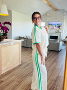 Close-up of the ENTRO CREAM PANT SET fabric, made of 82% cotton and 18% polyester for a breathable and comfy feel.