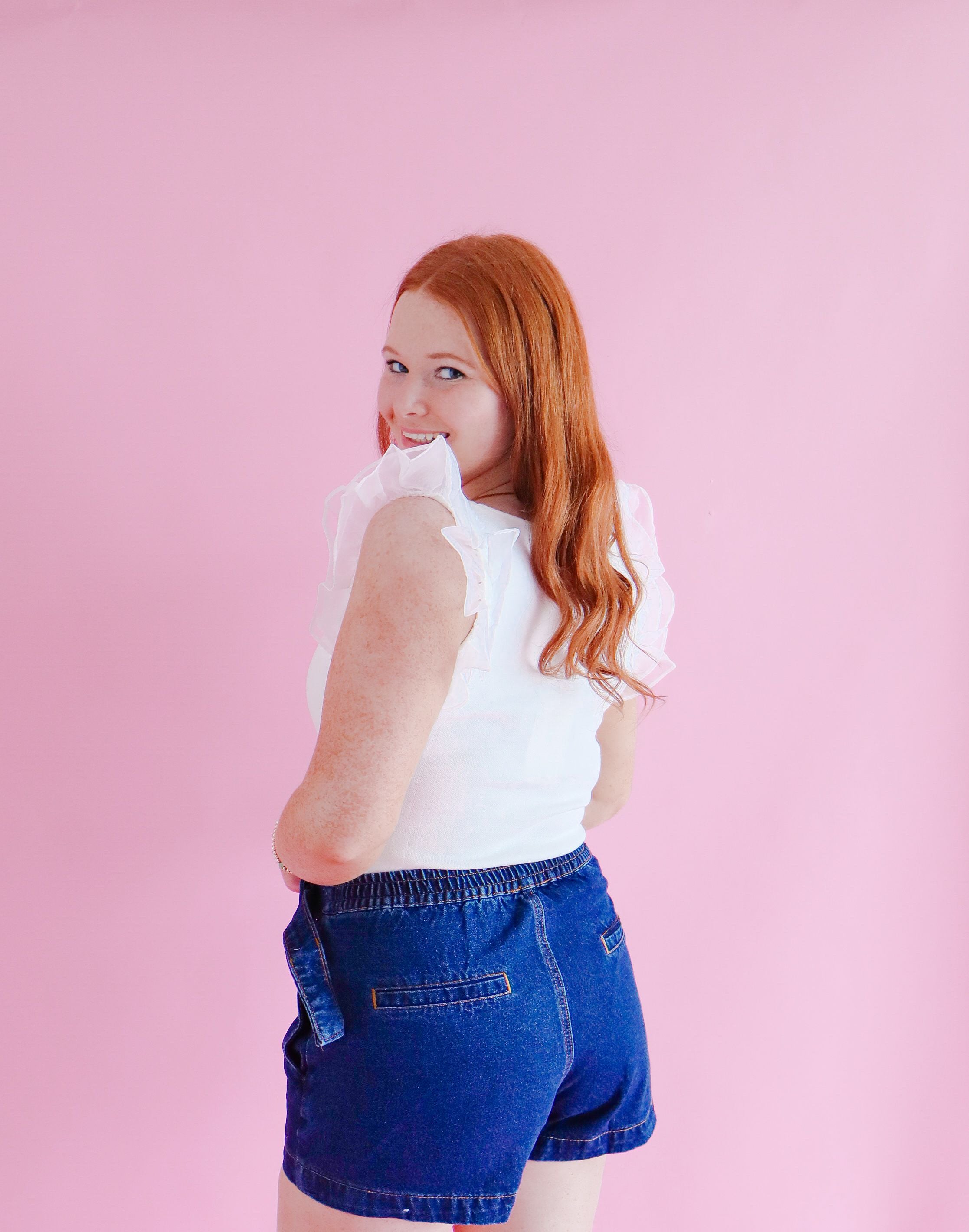 Close-up of the Entro Dark Denim Skort highlighting the fabric texture, perfect for dressing up or wearing casually with your favorite tee.