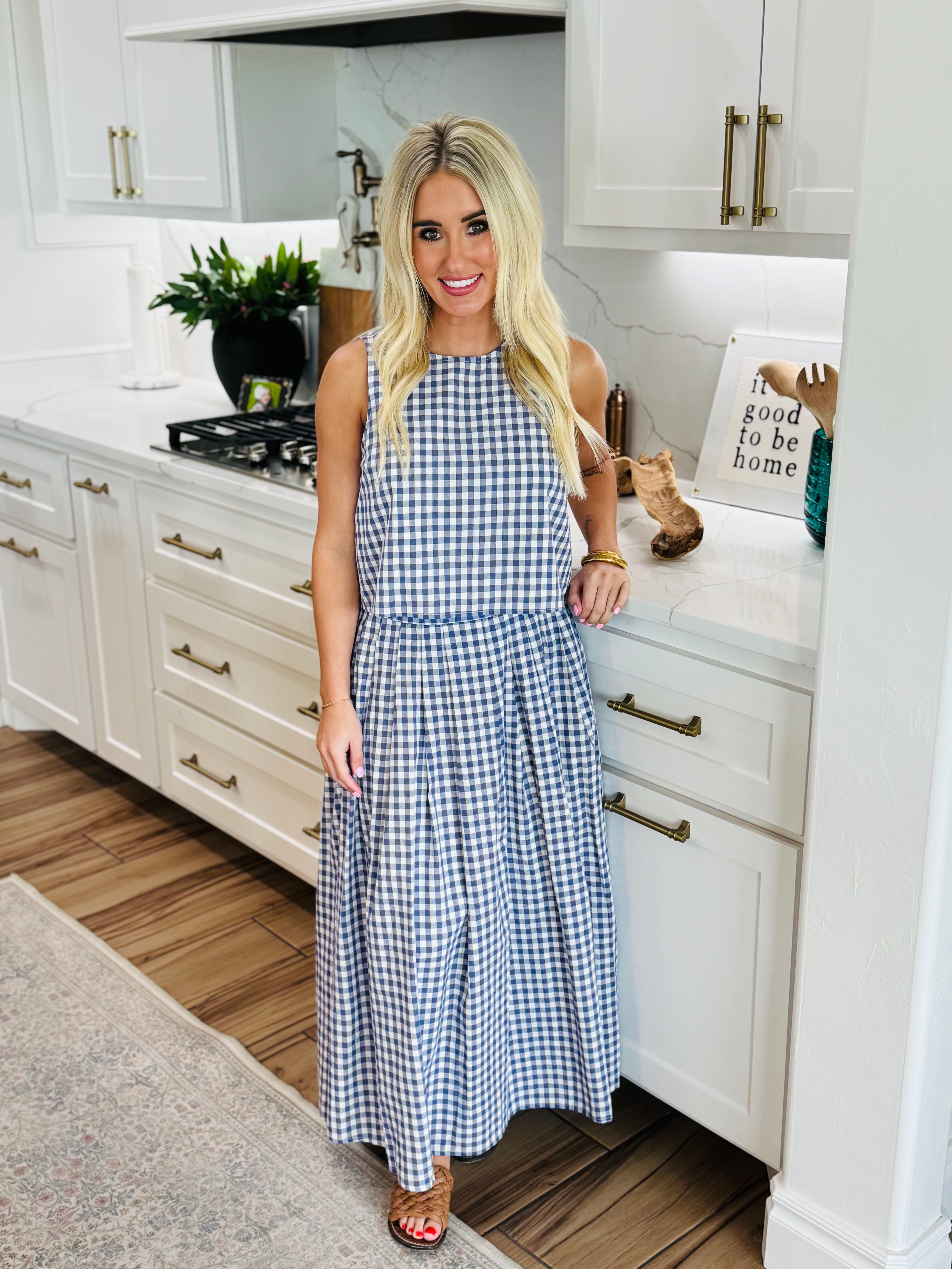 Blue Gingham Matching Skirt Set showcasing a relaxed summer vibe with a sleeveless top and maxi skirt combination, perfect for warm-weather outings.