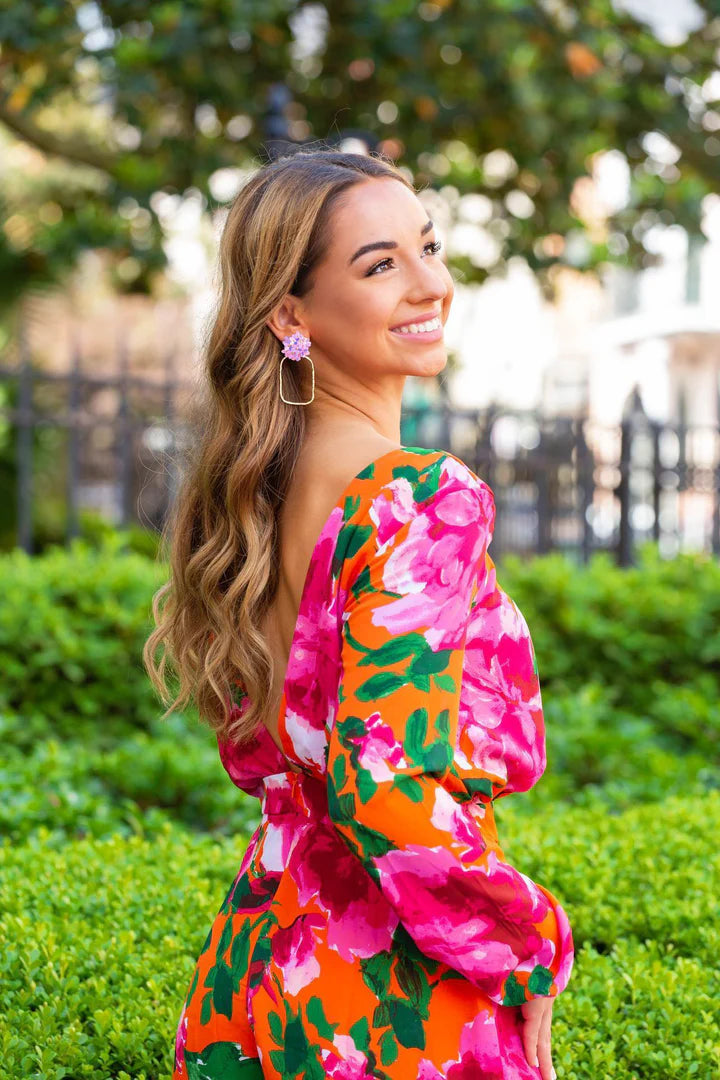 Pink Iridescent Flower Top Hoops by Taylor Shaye, featuring a soft and lightweight design perfect for elegant or casual outfits.