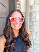 LINNY IN PINK SUNGLASSES- DAX EYEWEAR
