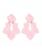 Michelle Statement Earrings - Disco Pink featuring a 75mm shell-inspired design with a light pink metallic shimmer, perfect for adding sparkle to any outfit.