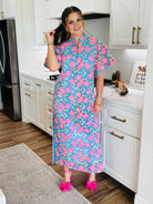Close-up of the LEIGHTON PANSY MAXI DRESS BY BUDDY LOVE showing the beautiful floral design and luxurious fabric texture.