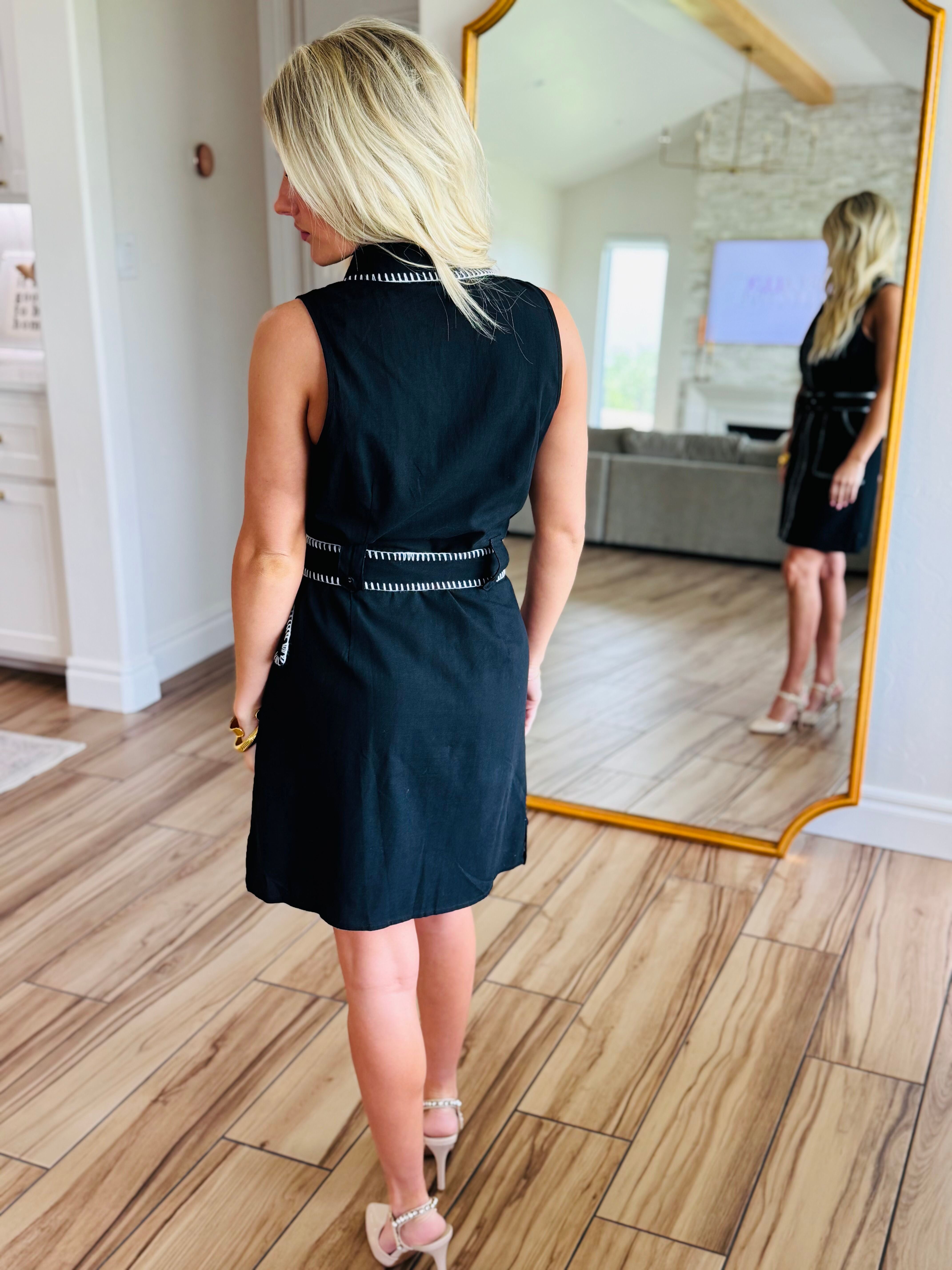 Styled look featuring the Black Sleeveless Dress with Contrast Stitching paired with accessories, perfect for showcasing versatility and modern fashion details.