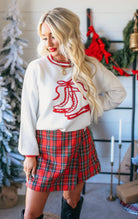 RED AND WHITE HOLIDAY ICE SKATES KNIT SWEATER - Tops