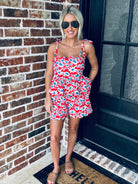 Full view of the Red, White and Blue Floral Matching Short Set styled with accessories for a festive daytime outfit.