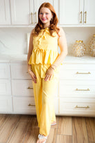 LEMON YELLOW ELASTIC WAIST SCALLOPED BOTTOM PANTS showcasing a stylish high-waist scallop hem design, perfect for a trendy summer look.