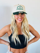 TAKE ME OUT TO THE BALLGAME TRUCKER HAT in green and natural design, perfect for sports lovers and adventurers.
