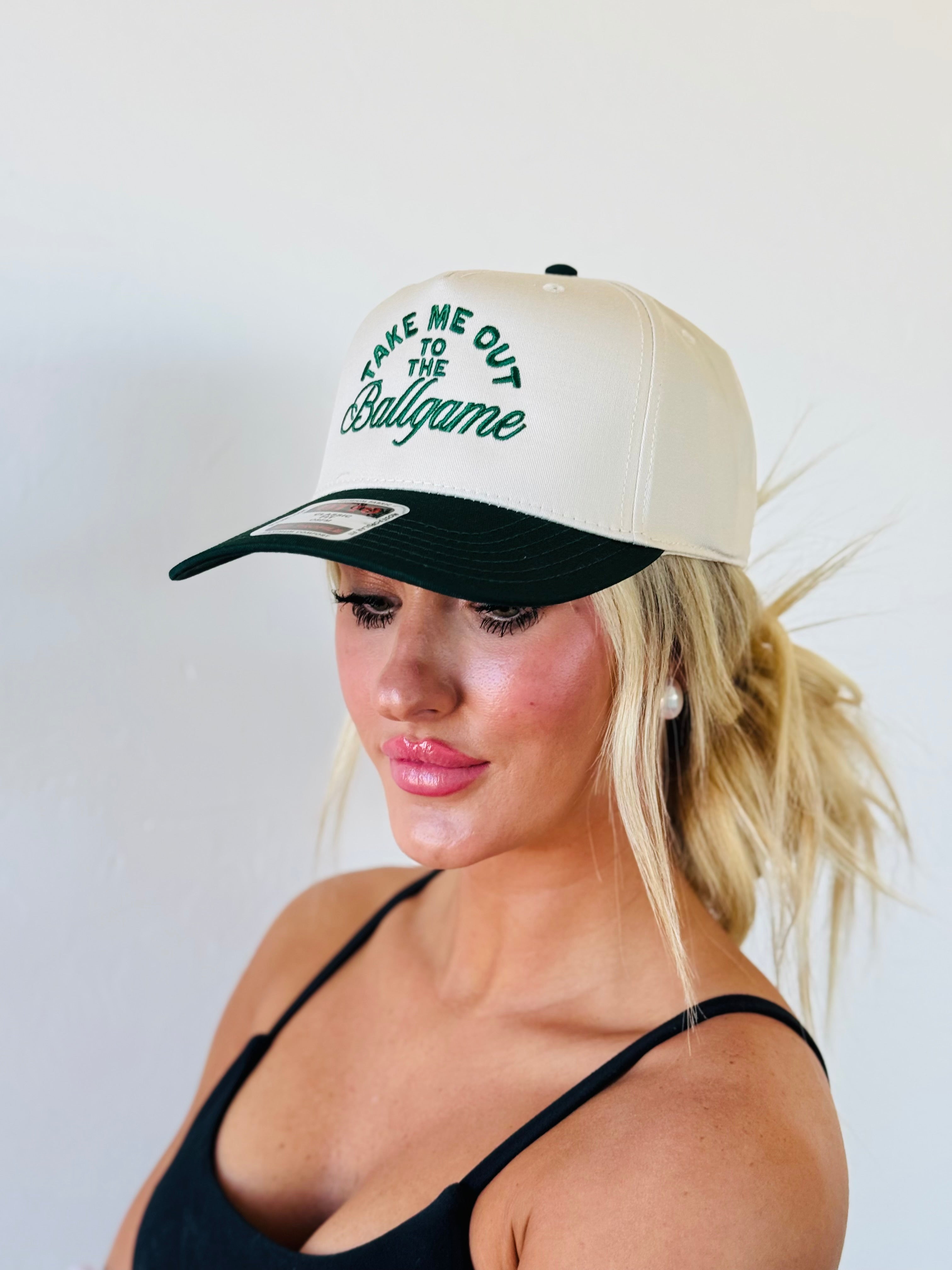 TAKE ME OUT TO THE BALLGAME TRUCKER HAT in stylish green and natural design, perfect for baseball lovers.