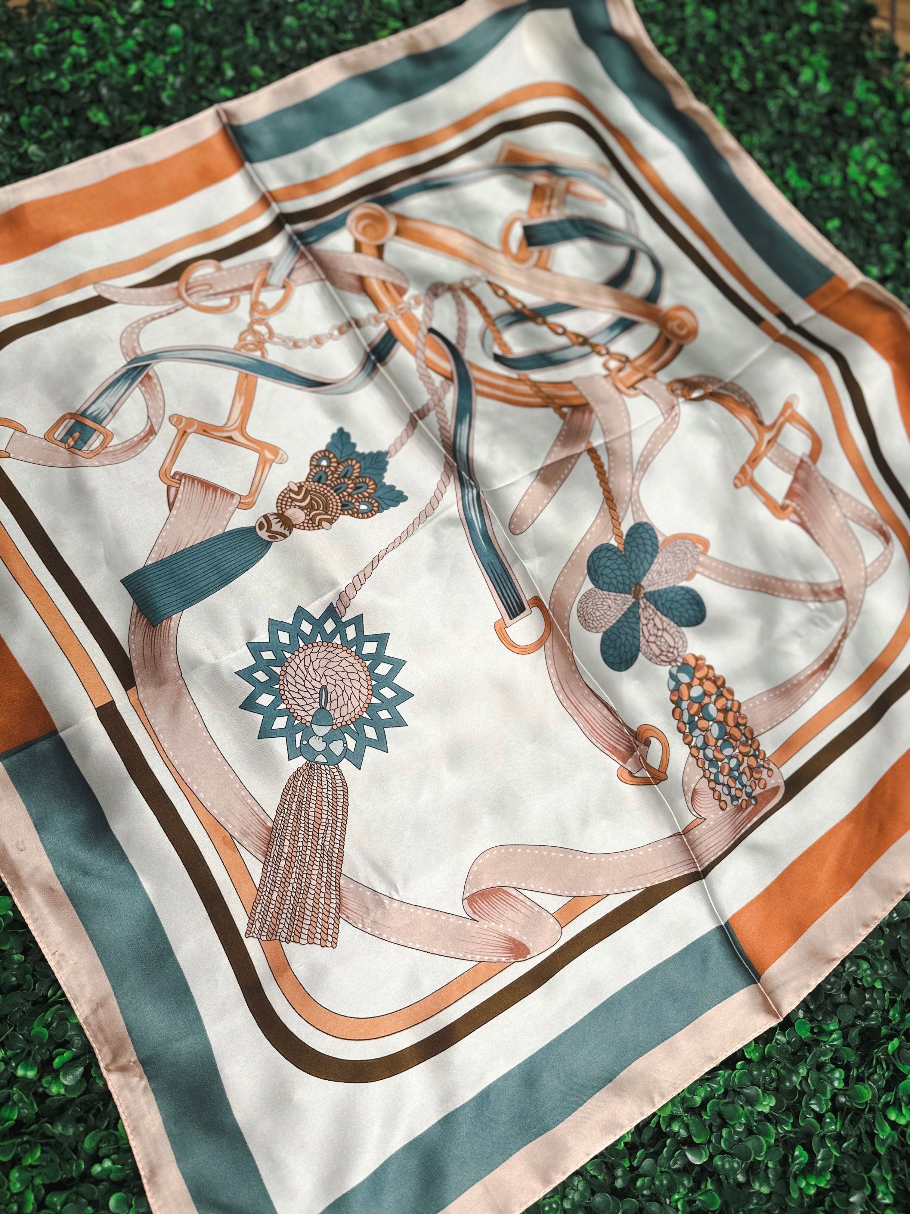 TEAL AND ORANGE ROPE PRINT NECK SCARF